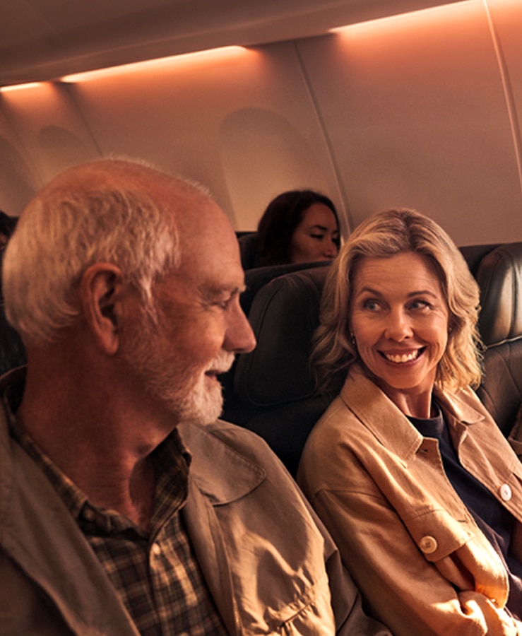 family travelling on plane