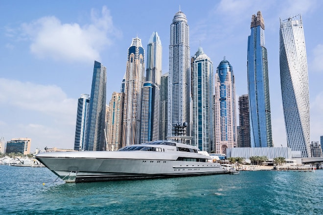 Boat on Marina with Dubai skyline