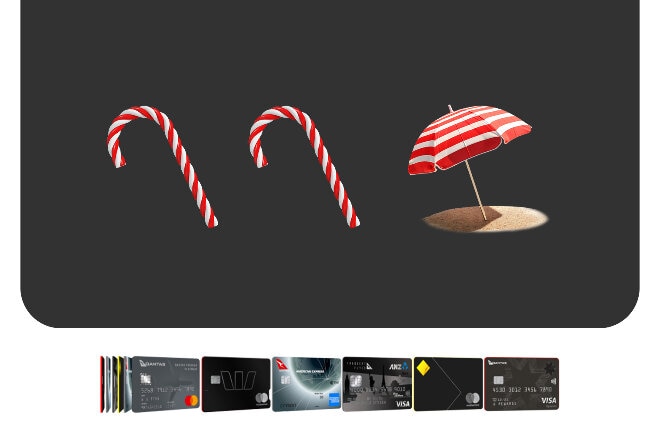 Variety of credit cards, candy canes and beach umbrella