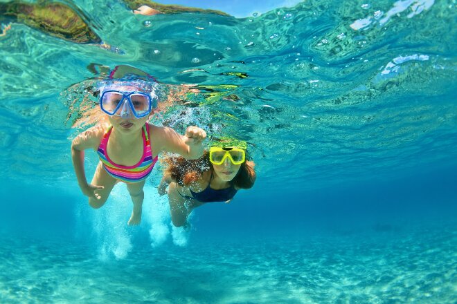 Mother and daughter snorkelling on the Great Barrier Reef