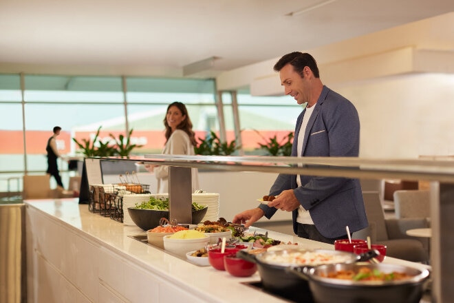 Gold members enjoying the buffet in the lounge