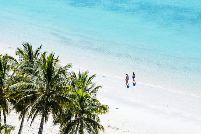 Couple walking on hamilton island