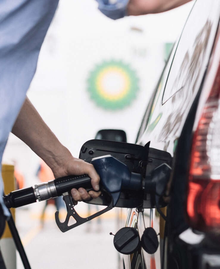 filling up car at petrol station