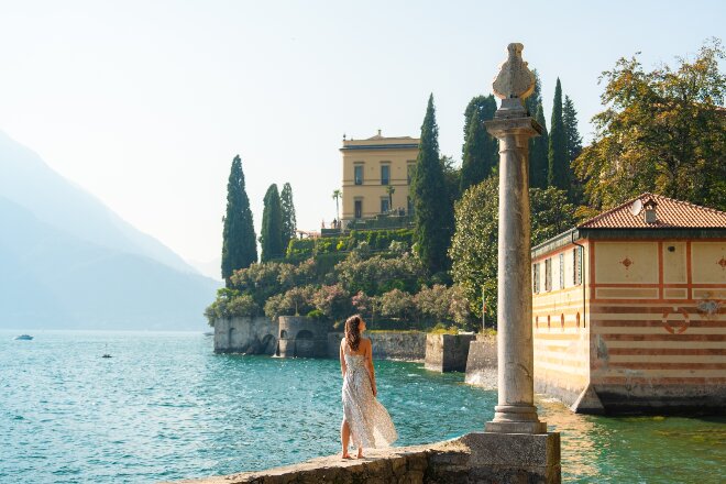 Lady walking along Lake Como, Italy