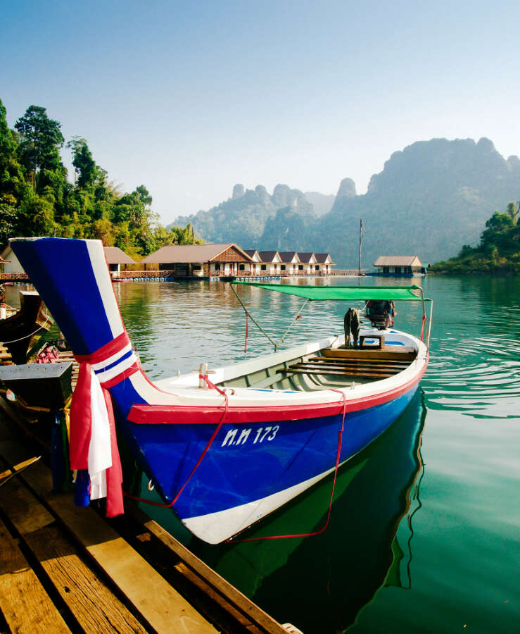 Long tail boat moored at a jetty in Thailand