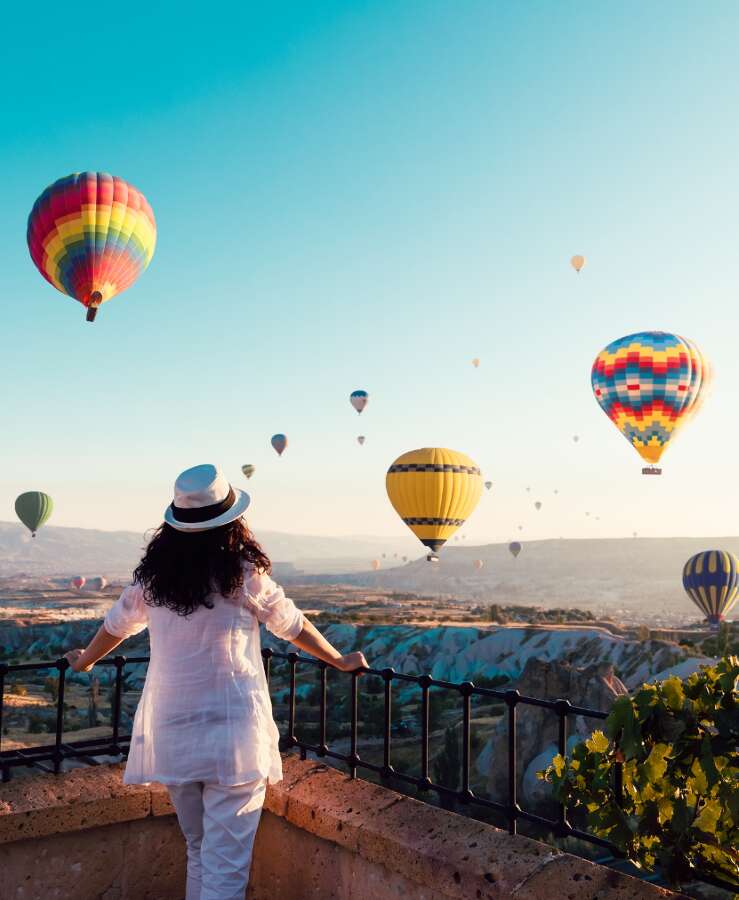 woman overlooking turkey cappadocia hot air balloon