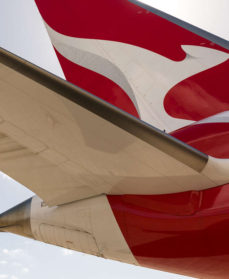 Qantas plane tail blue sky 