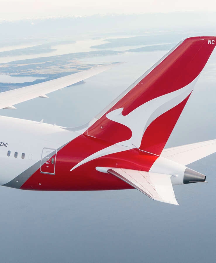 Qantas Dreamliner aircraft in the sky