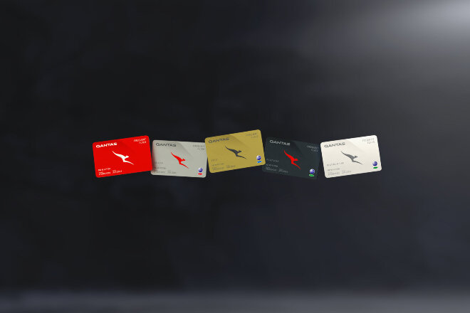 Qantas Frequent Flyer membership cards on black background