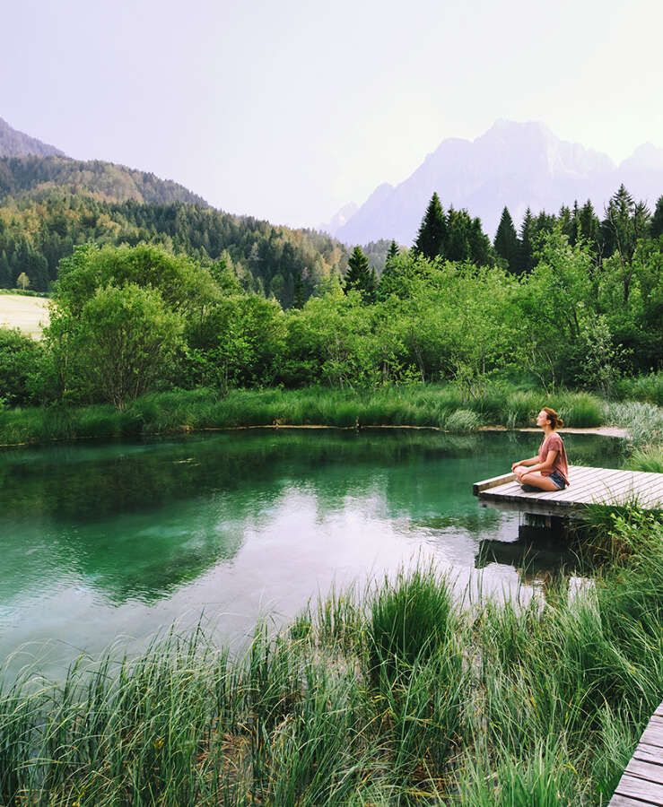 woman meditating in nature