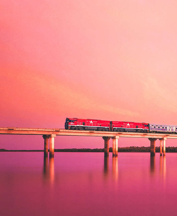 train with pink sky backdrop