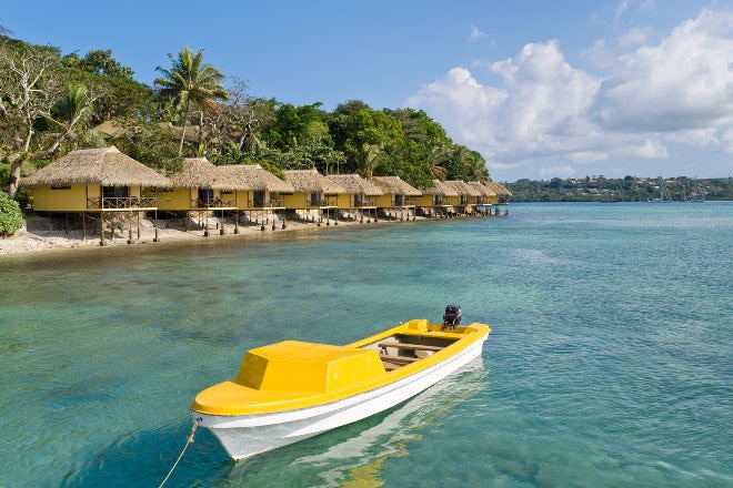 Yellow Boat on water in Tahiti