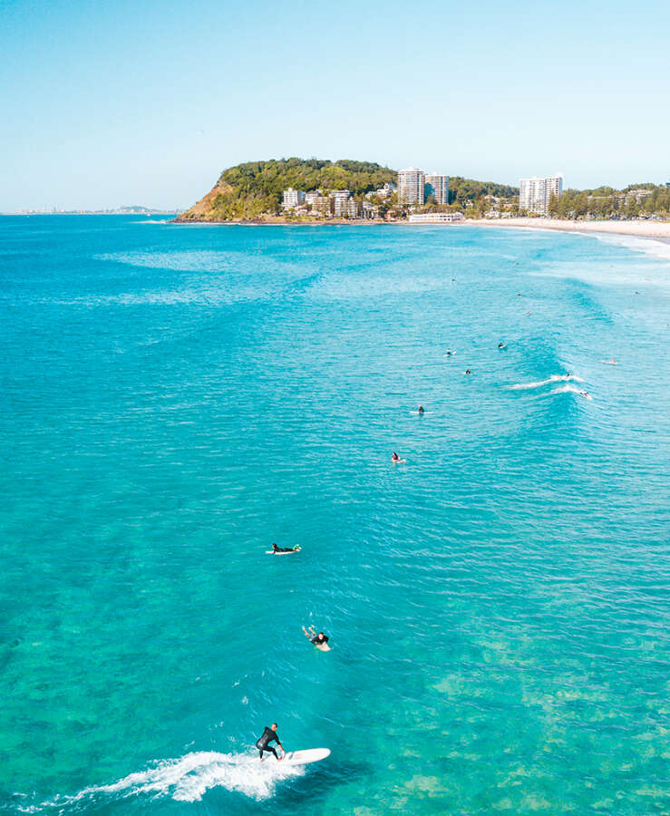 gold coast surfers at beach