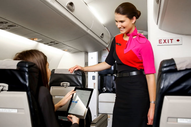 Passengers in cabin on QantasLink flight