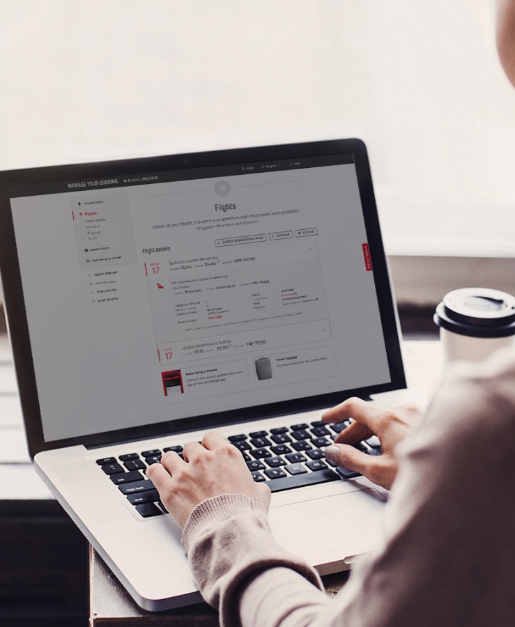 woman on laptop looking at flights