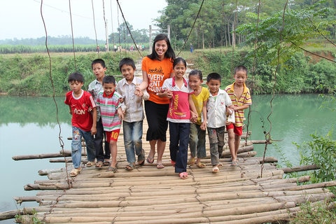 Group of children with Star Kids program representative