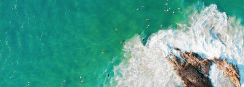 aerial image of waves on shoreline