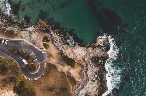 Overhead view of cars and coast in New South Wales