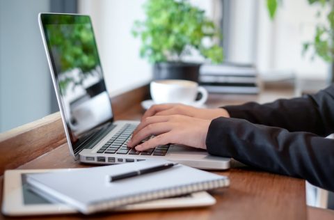 Office worker working at a laptop