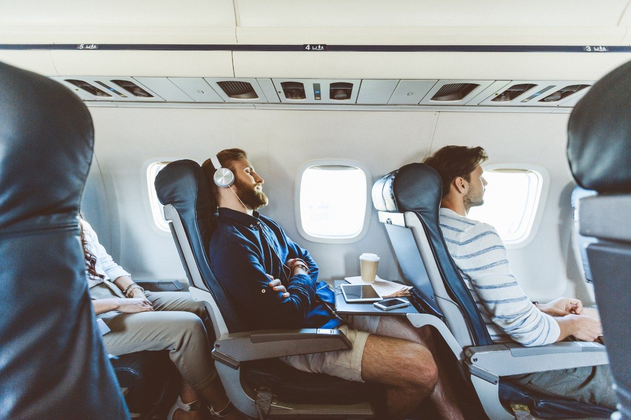 Expert tips for how to sleep on the plane