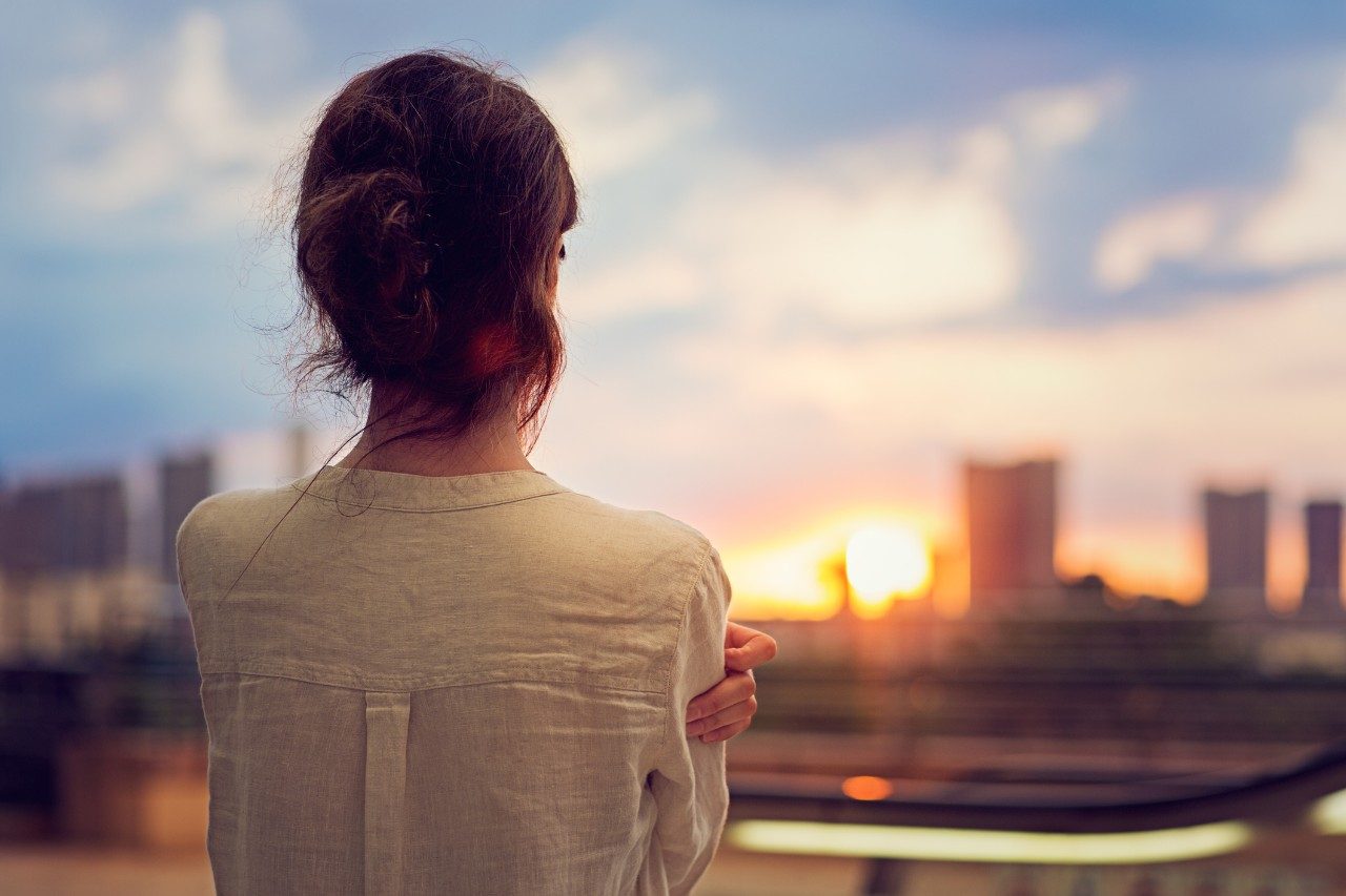 girl looking at sunrise