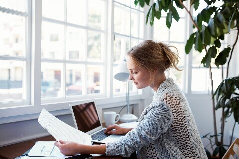 Lady sitting at a laptop