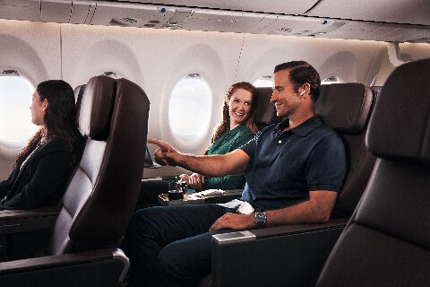 Couple enjoying business class in an A220