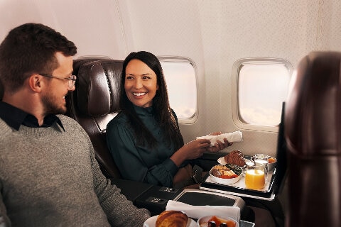 Couple dining 737 aircraft