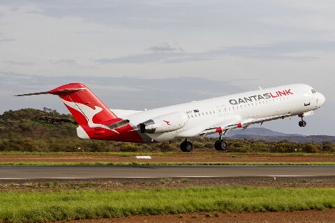 Fokker 100 taking off